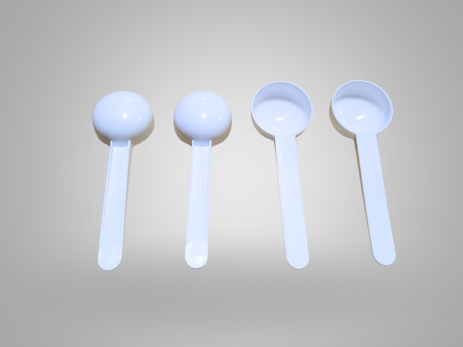 Oval dosing scoop · 10 g
